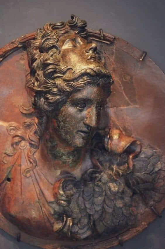 Greek Bronze Medallion with inlaid White Glass; depicts goddess Athena wearing the head of Medusa (200–150 BC), it was found in Thessaloniki, Greece.

– Archaeological Museum of Thessaloniki, Greece.