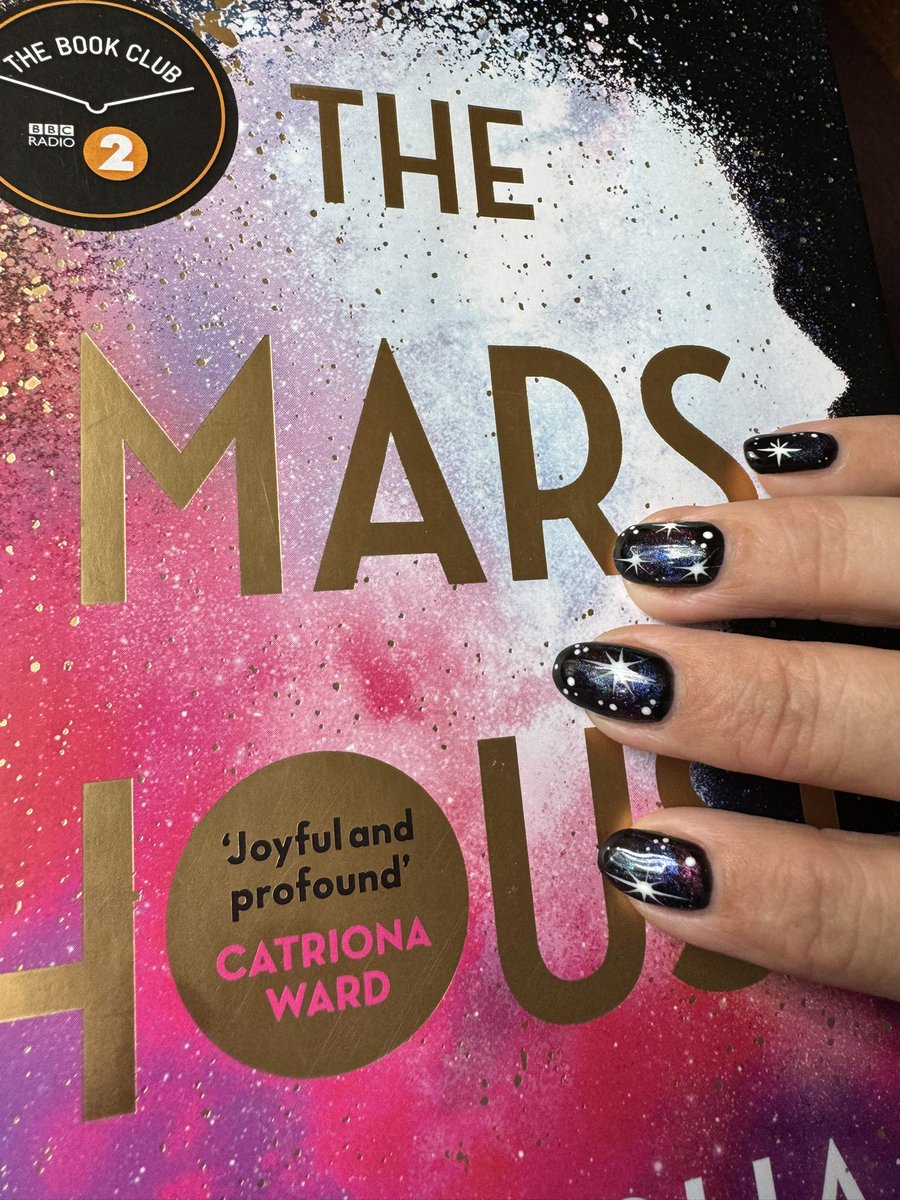 On my second re-read of #TheMarsHouse and it just keeps getting better and better with every inhalation. Space nails obviously therefore required @natasha_pulley