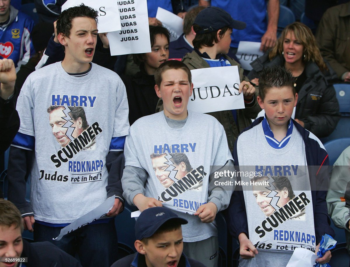 A young Portsmouth fan shows his feelings to Portsmouth's former manager Harry Redknapp at the start of the Barclays Premiership match between Portsmouth and Southampton at Fratton Park (2005)