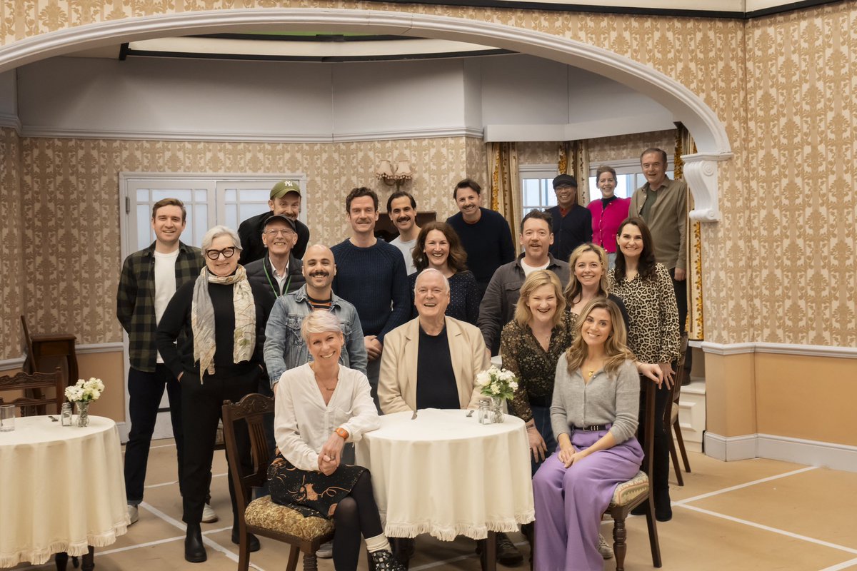 It wouldn’t be #FawltyTowers without <a href="/JohnCleese/">John Cleese</a> 🛎️ Check out this #behindthescenes image of our wonderful cast with #JohnCleese 🎭 Only 8 days until we open - who’s coming to check in?! #FawltyTowersThePlay