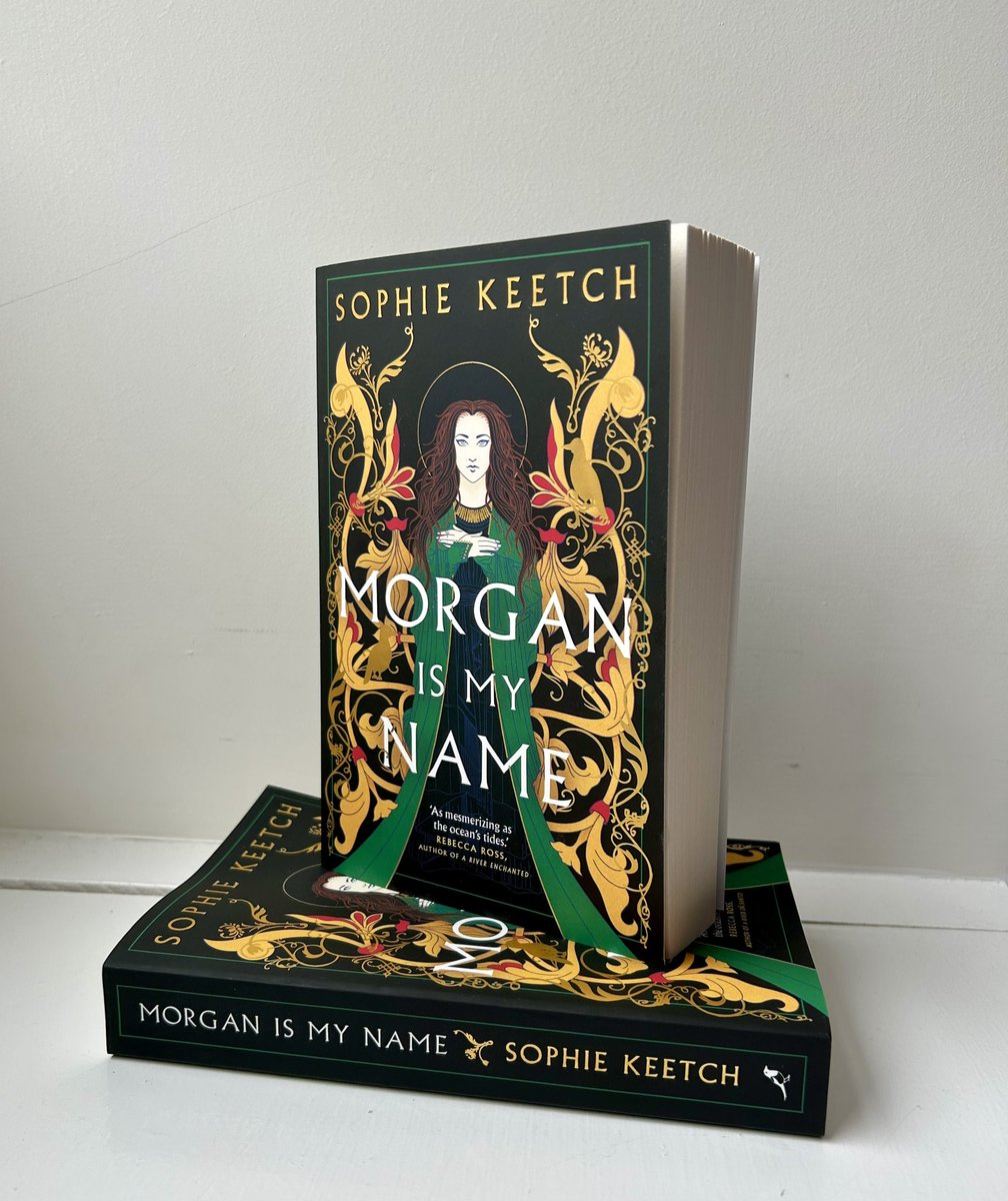 Just remembered that the paperback of Morgan Is My Name publishes in ✨ONE WEEK✨ (as well as an exciting secret thing that I can’t talk about 🤫) She’s as shining & glorious as her hardback sister, catching the light here like she’s standing in a cathedral 😍📚 #BookTwitter