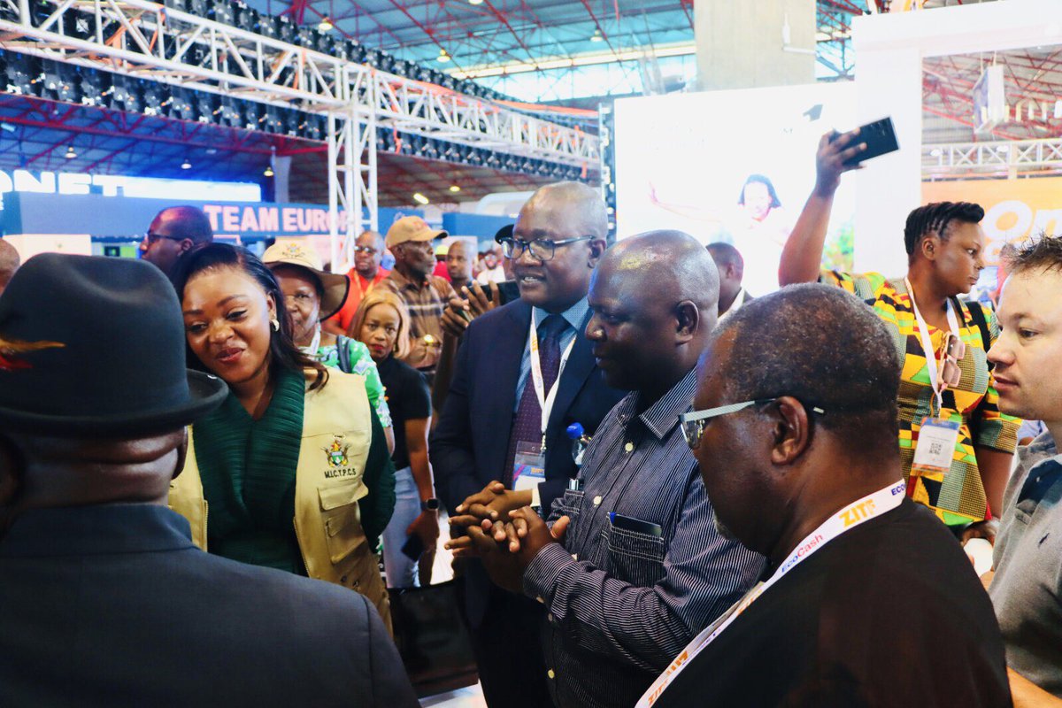 Honourable Minister of Information Communication Technology & Courier Services, Dr. Tatenda Mavetera being led by GCEO Eng. Raphael Mushanawani as she tours the NetOne stand. Our expert, Tapiwa Chikwanda explains in detail the e-tolling service as the Minister attentively listens