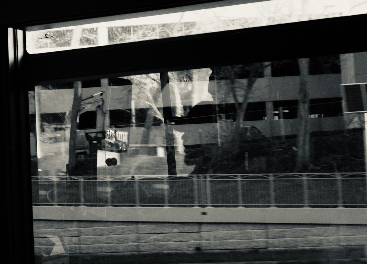 Reflections of my bus driver... #blackandwhitephoto #RidingTheBus #CityLife