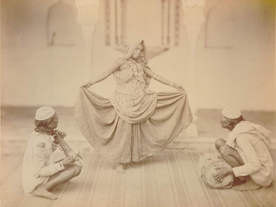 Dancer with two musicians in India - 1860s