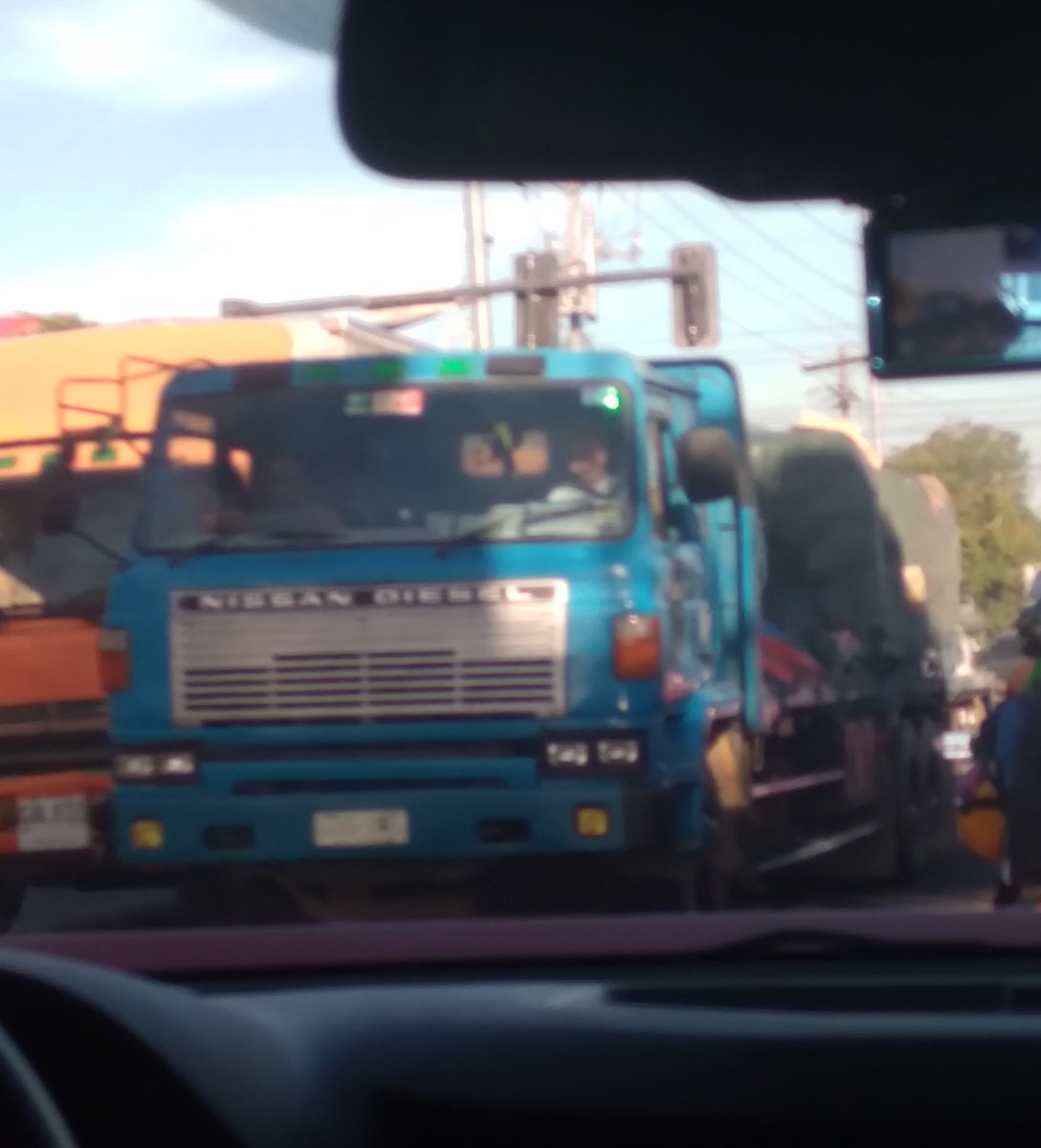 The same Blue Nissan Diesel Resona CD spotted once again, this time carrying construction materials for a construction project.
