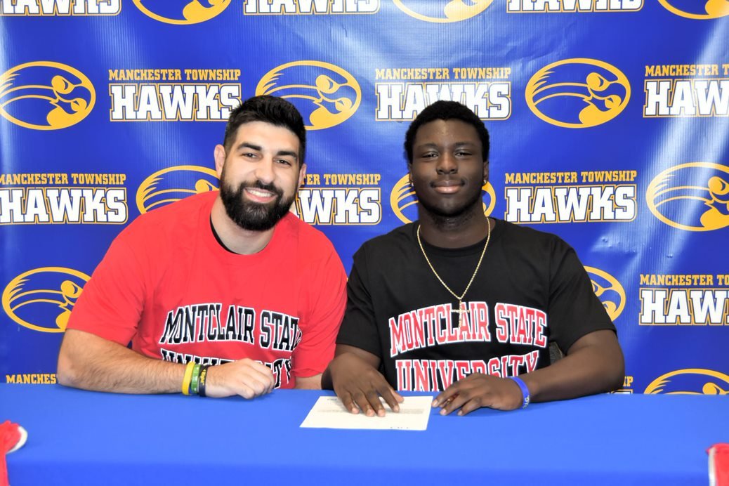 MTHS_Sports's tweet photo. Congratulations to Matthias Payton for signing with Montclair State University to continue his academic and football career.  Here with family, Coach Farrell, teammates and friends.  @montclairstateu @APPSportsDesk @HSSportsNJ https://t.co/Etj862tYO7
