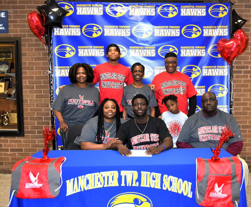 MTHS_Sports's tweet photo. Congratulations to Matthias Payton for signing with Montclair State University to continue his academic and football career.  Here with family, Coach Farrell, teammates and friends.  @montclairstateu @APPSportsDesk @HSSportsNJ https://t.co/Etj862tYO7