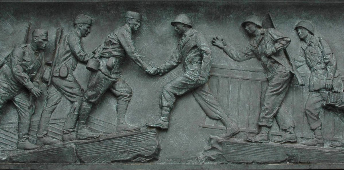 #OTD in 1945, American & Soviet forces met at the Elbe River, cutting Nazi Germany in two and bringing the end of World War II in Europe closer. A bronze panel in the WWII Memorial shows the scene of soldiers from East & West meeting at a battered bridge near the city of Torgau.