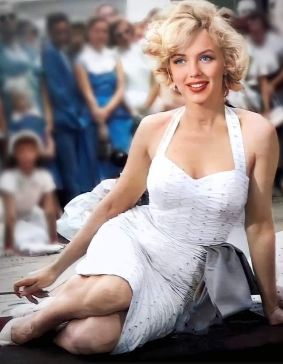 Marilyn Monroe leaving her hands and foot prints in wet cement at Graumann's Chinese Theater in 1953. An honor reserved for few Hollywood immortals.
