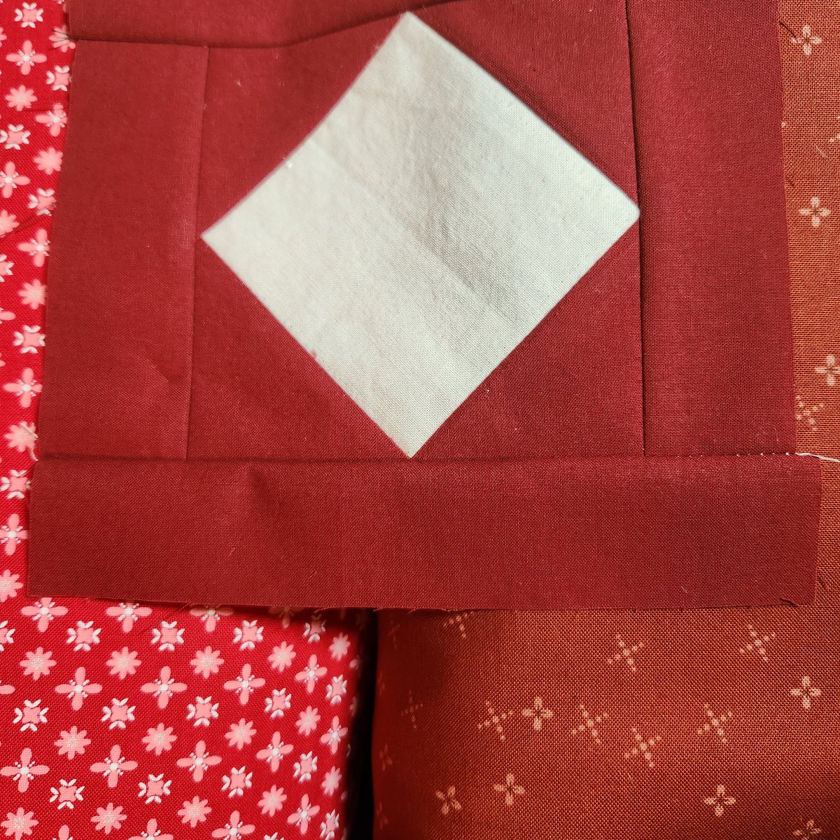 SeptemberFruits's tweet photo. New fabric for my dad's quilt backing also doesn't match. The old one is very red, the new one is very brown, and I really should stop buying fabric on the internet and go to a quilting store. https://t.co/HiuEdd4M2y