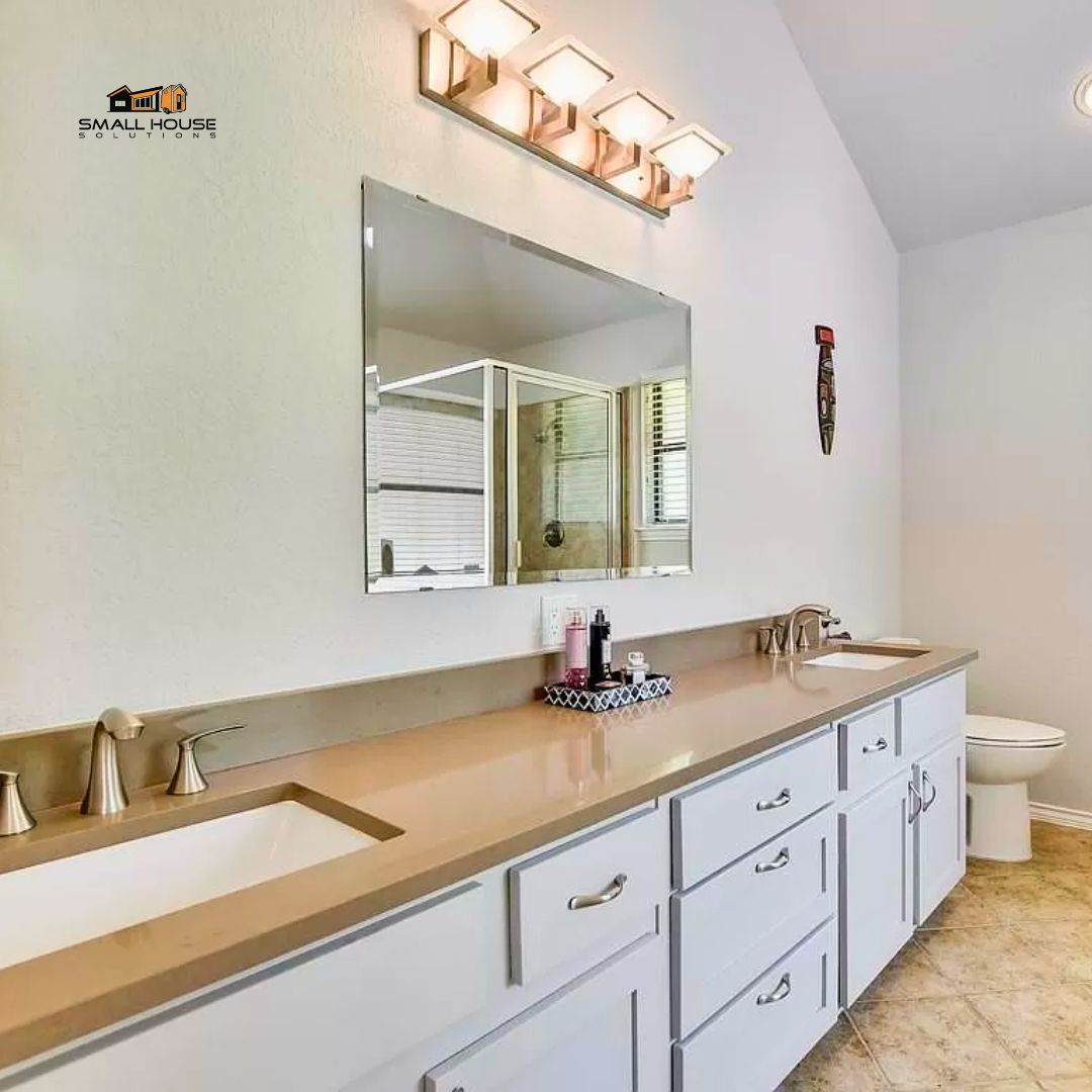 Your self-care ritual deserves this. ✨ The master bathroom at Barker Ridge Brick House combines clean lines with chic fixtures for a spa-like experience every day. Ready to pamper yourself? #SmallHouseSolutions #bathroomgoals