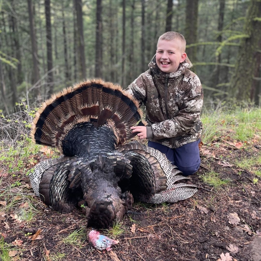 Maverick was all smiles for his first turkey! How old were you when you harvested your first turkey? 📸: Huntandheal via IG