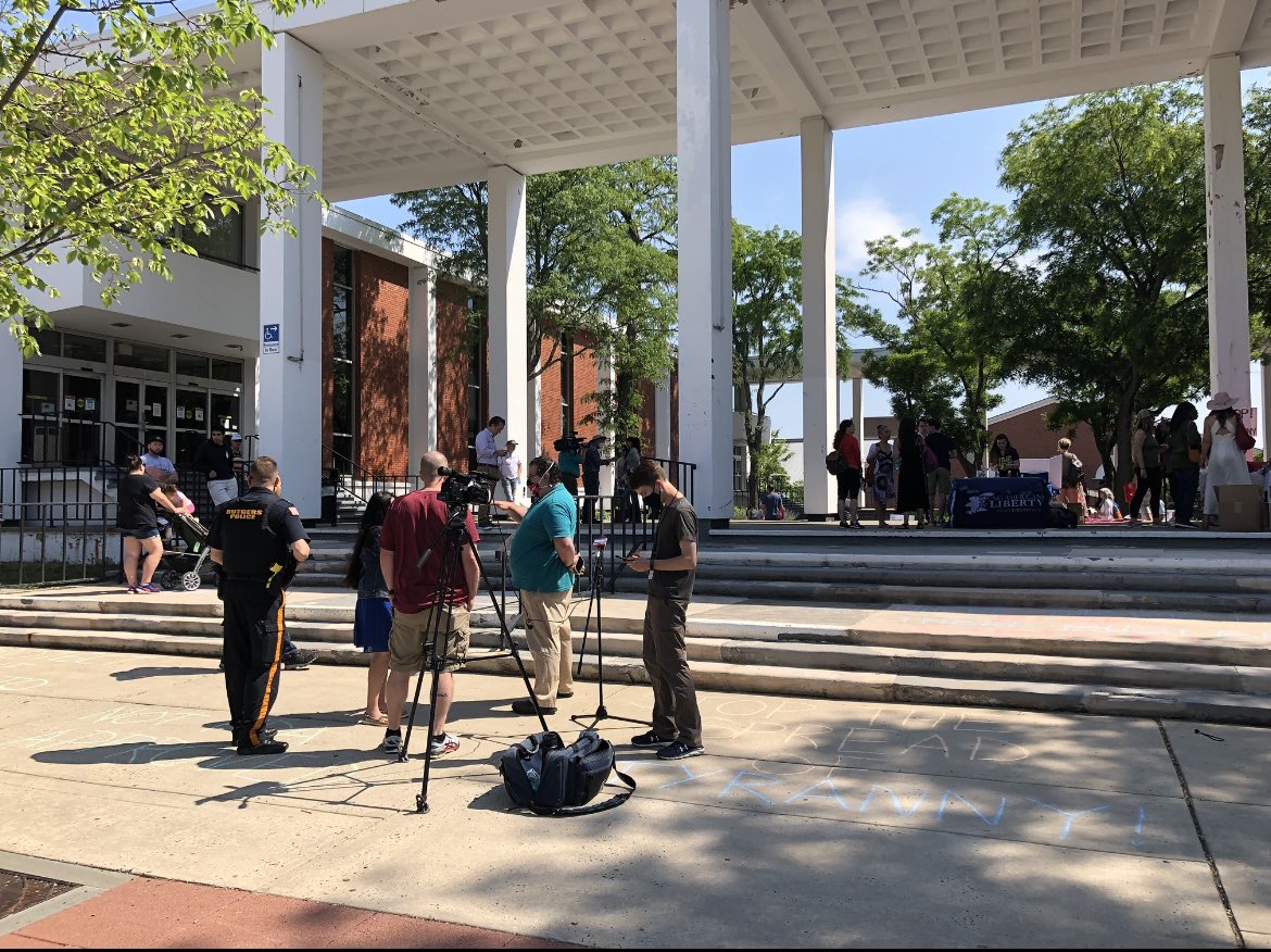 Reason #1 why no college/university is pro free speech. This pic was taken on 5/21/21 at my first medical freedom rally at RU. I was surrounded by a bureaucrat and a few officers. They were trying to shut my rally down b/c we were using a “microphone.” I told them to fuck off