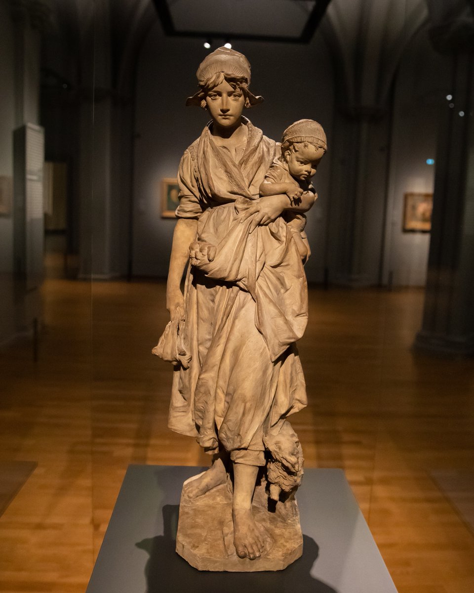 This is an artwork fit for Mother’s Day. ♥️The statue shows a young woman holding her child. If you look closely, you can see puppies gathered in her apron, with the mother dog by her feet. 🚨 rijksmuseum.nl/en/stories