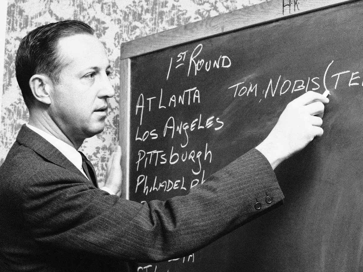 #NFLDraft, you've come a long way, baby! NFL commissioner Pete Rozelle, chalk, and a chalkboard at the 1966 #NFL Selection Meeting held at New York's Summit Hotel. There was no television or radio coverage of the event. Print media only.