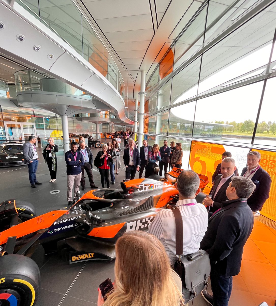 Thank you to our partner, @McLarenF1 Racing, for giving our attendees a wonderful tour! 💜🧡 #PowerUp