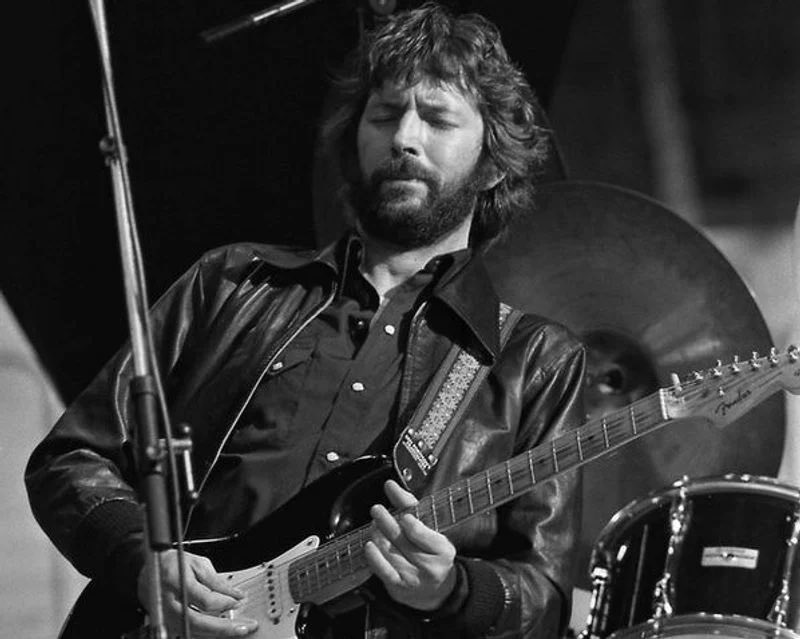 Eric Clapton photographed on stage in the 1970s. 📸: Chris Hakkens