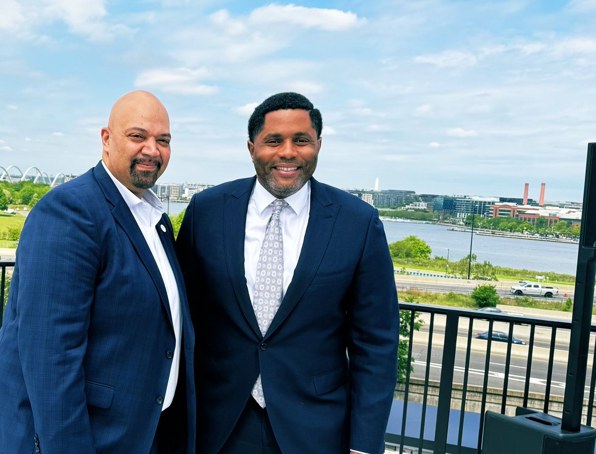 Before <a href="/MayorBowser/">Mayor Muriel Bowser</a>’s ribbon cutting for new <a href="/DCDHCD/">DC Department of Housing and Community Development</a> hq on MLK Av SE, #HistoricAnacostia, developer Bo Menkiti <a href="/BoMenkiti/">Bo Menkiti</a> &amp; Director Delano Hunter <a href="/DCDGS/">DC Department of General Services</a> on balcony w. #AnacostiaRiver, #WashingtonMonument in background. <a href="/MenkitiGroup/">The Menkiti Group</a>