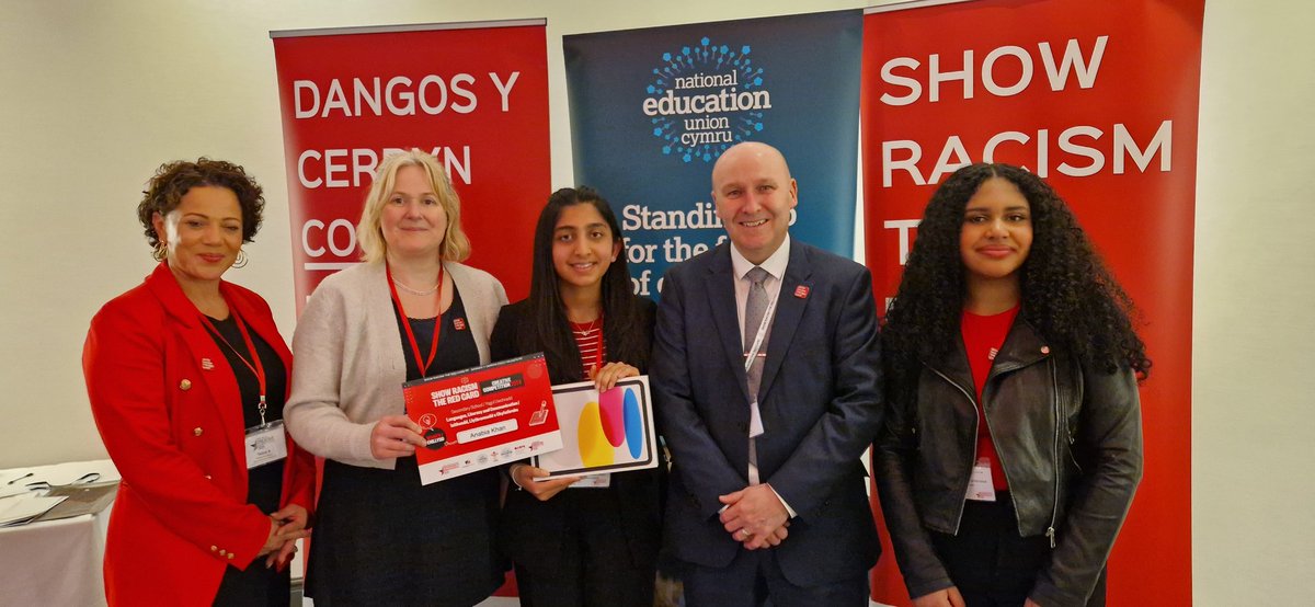 Inspiring day in #Cardiff for the #ShowRacismtheRedCard #Wales Creative Competition Awards. Well done to all the 460 Schools and 90,000 young people who took part. Pic of overall winner Anabia Khan receiving her Ipad off @NEUnion @theredcardwales @NEUCymru