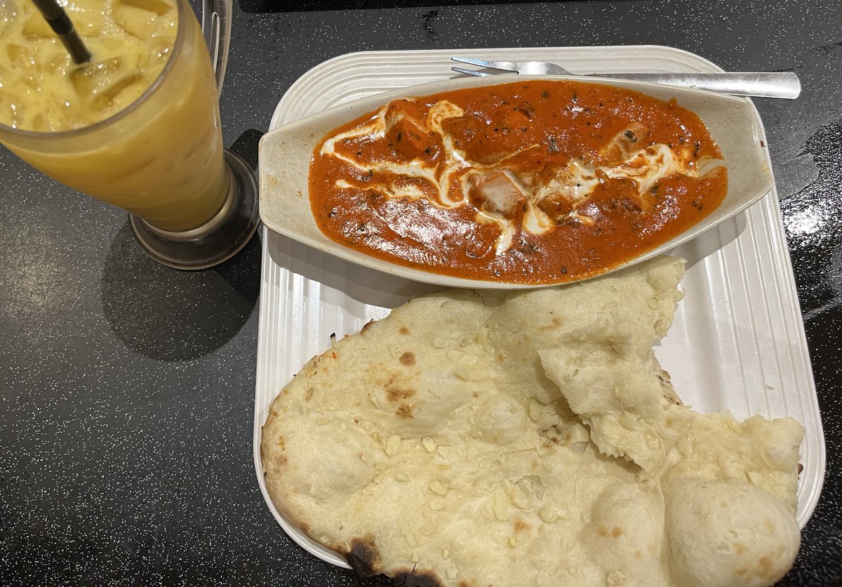 ordered butter chicken, garlic naan and mango lassi with a straight face today 😁