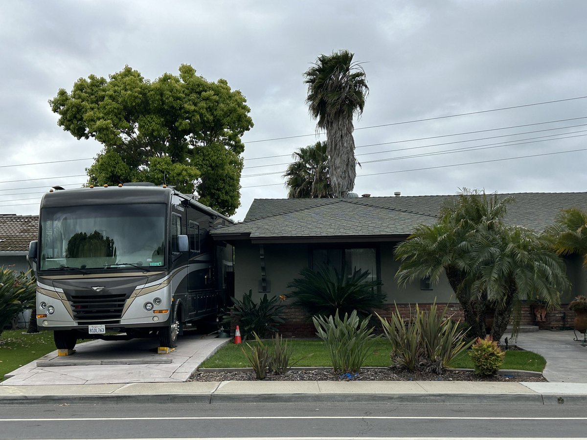 The NIMBY car brain says apartments ruin neighborhood character but whatever these are have a motor and wheels so they are fine.