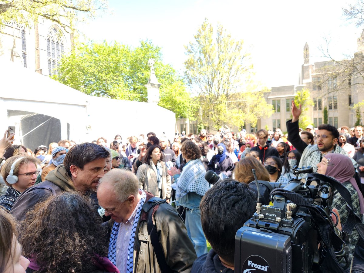 Former NYT Middle East correspondent Chris Hedges was reading a poem for Palestinian children at Princeton's protest for Gaza when campus police appeared to interrupt him. 

He was just led away from the protest to chants of 'shame' and 'let him speak.'
