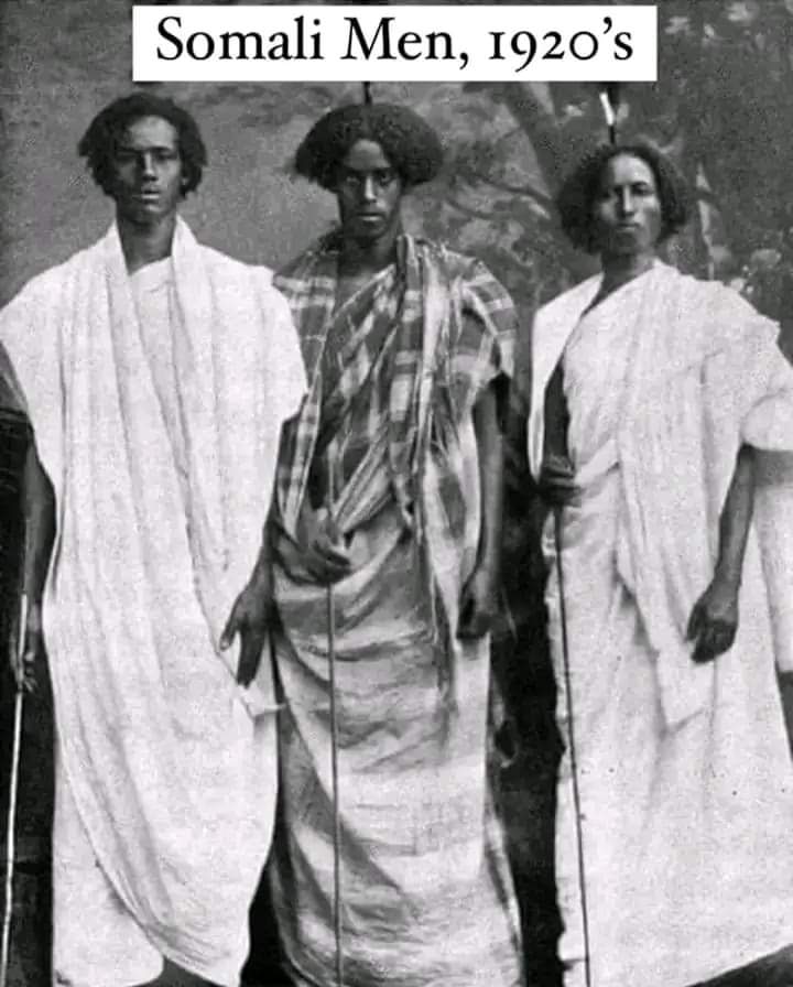 In Somaliland Tradition,placing ostrich feathers on the head,particularly with Young men is a Mark of bravery,heroism,and a man with high fighting skills.
These three Young men were Photographed in the 1920's near the portcity of Berbera .