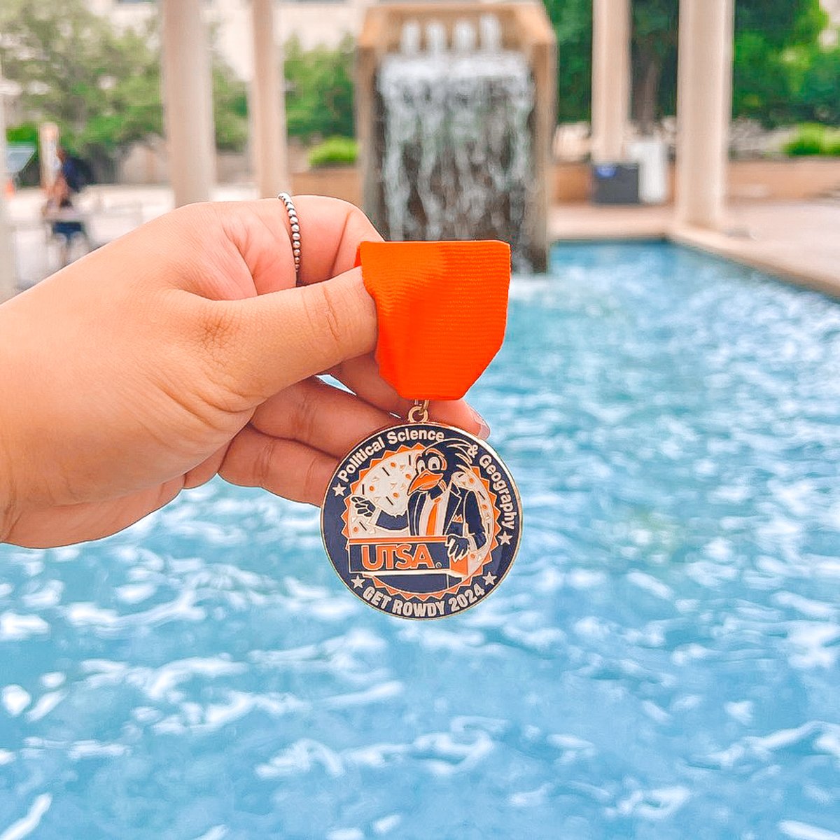 Check out this really cool <a href="/UTSA_DPSG/">UTSA Political Science and Geography</a> medal! 🤩 That slogan gets our vote. 🧡 💙 

#UTSA #FiestaSA
