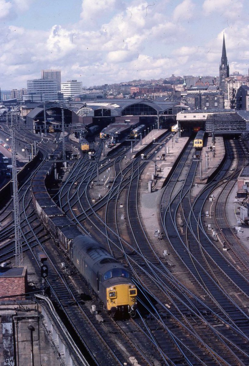 37058 snakes through Newcastle Central with coal hoppers 14th May 1977 #ThirtySevensOnThursday 📸 Stephen Burdett