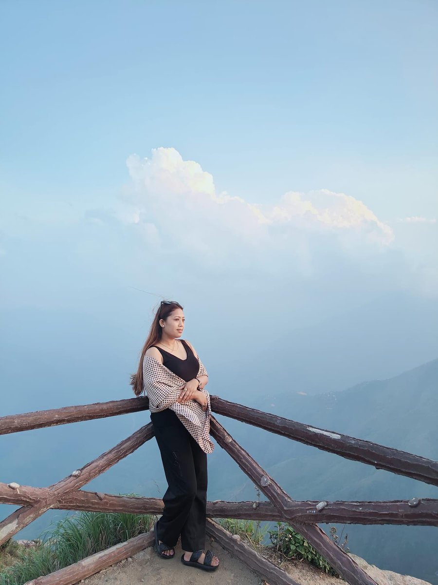 Enjoying the view at Laitlum, nature's masterpiece unveiled.

#MeghalayaMagic  #exploremeghalaya  #meghalayatourism  #traveldiaries