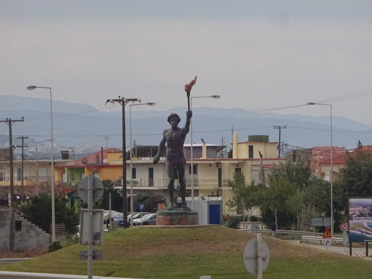 As today, 20 years ago the Flame crossed the Antirrio Bridge for the first time, there is an appropriate statue close by.