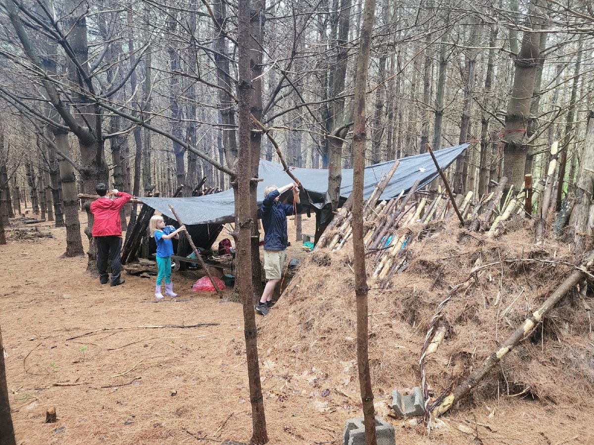 🏕️ Building memories at Earthworks Camp! 🌿 Our young campers using their creativity and teamwork to construct a shelter with logs and other materials. Learning to respect and protect nature starts here. 🌿