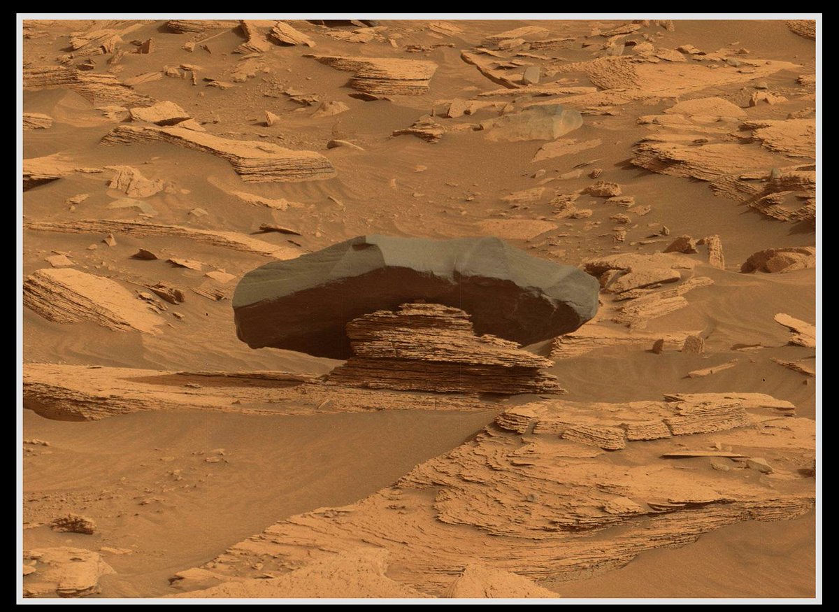 Ok, geologists who Follow me - what's going on here, with this big dark block of rock sat on its own surrounded by all this flaky, lighter rock? @MarsCuriosity Sol 4164 original images credit: NASA/JPL-Caltech/MSSS Additional processing: S Atkinson