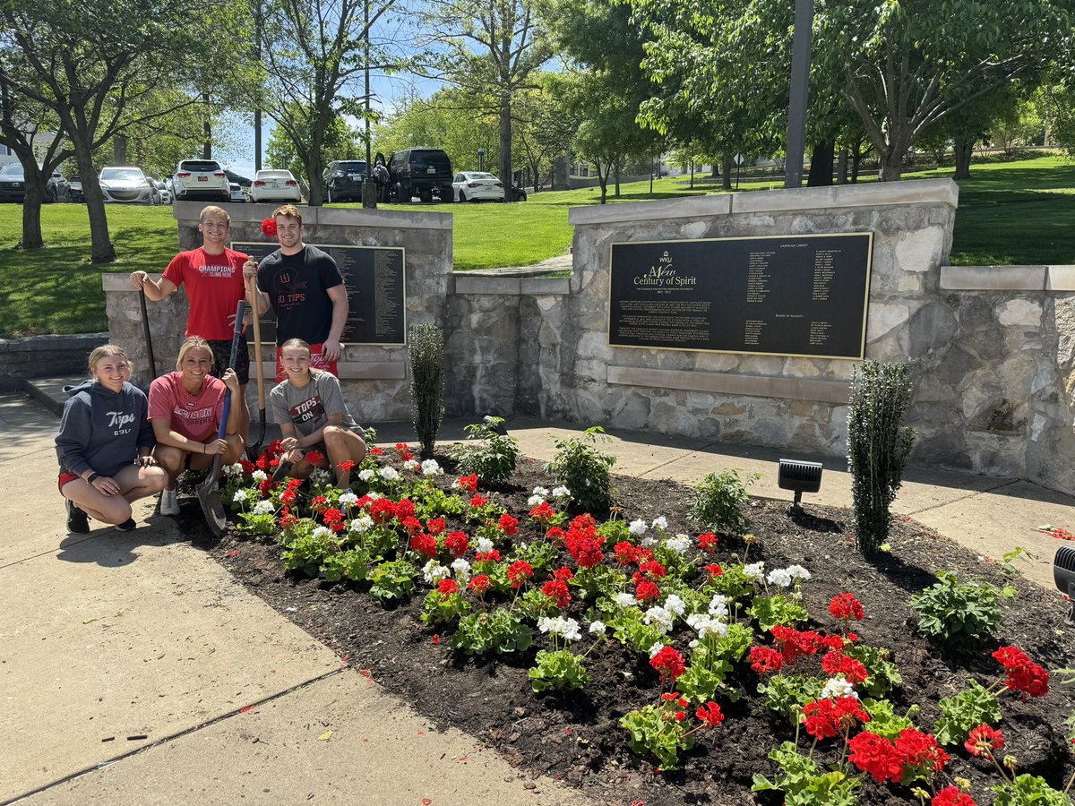 Celebrating 🌎 Day this week by working with WKU Grounds Management to plant flowers around our friend @WKUBigRed ! 🔴 Always a fun day giving back to our campus that gives us so much! #HilltoppersWithHeart