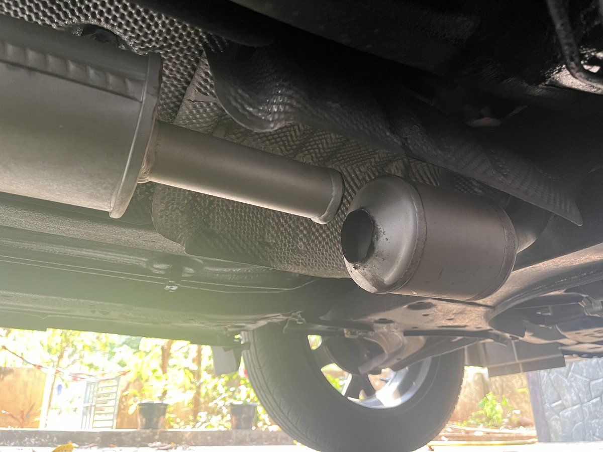 rineshpk's tweet photo. @Nissan_India @Saurabh_Vatsa "World-class offering? Silencer falling apart at 5000 kms! Livid with lack of quality. Before buying #NissanMagnite, search for magnite silencer issues.Tons of images like this show Nissan selling Magnite with defective silencers. Poor quality standards #Nissan #NissanMotorIndia https://t.co/ffcGFq3eAN