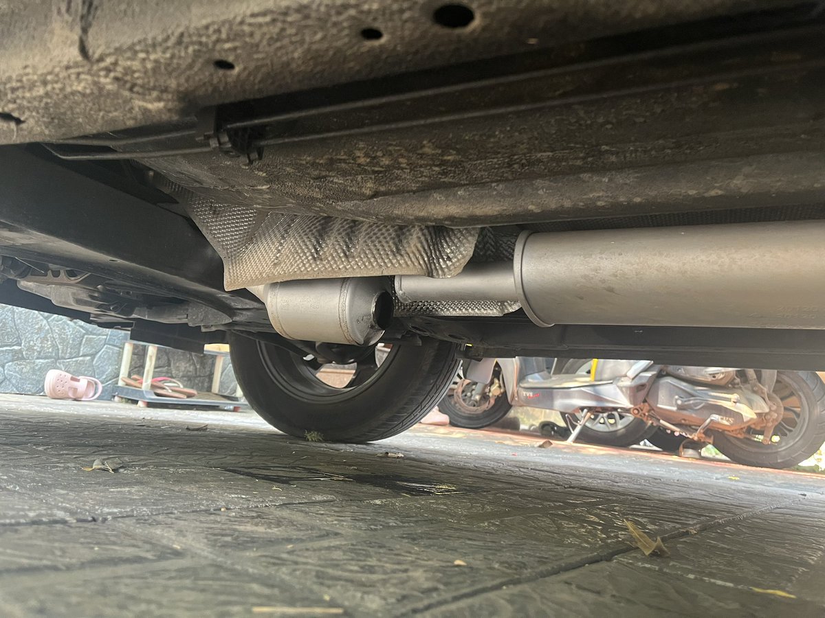 rineshpk's tweet photo. @Nissan_India @Saurabh_Vatsa "World-class offering? Silencer falling apart at 5000 kms! Livid with lack of quality. Before buying #NissanMagnite, search for magnite silencer issues.Tons of images like this show Nissan selling Magnite with defective silencers. Poor quality standards #Nissan #NissanMotorIndia https://t.co/ffcGFq3eAN
