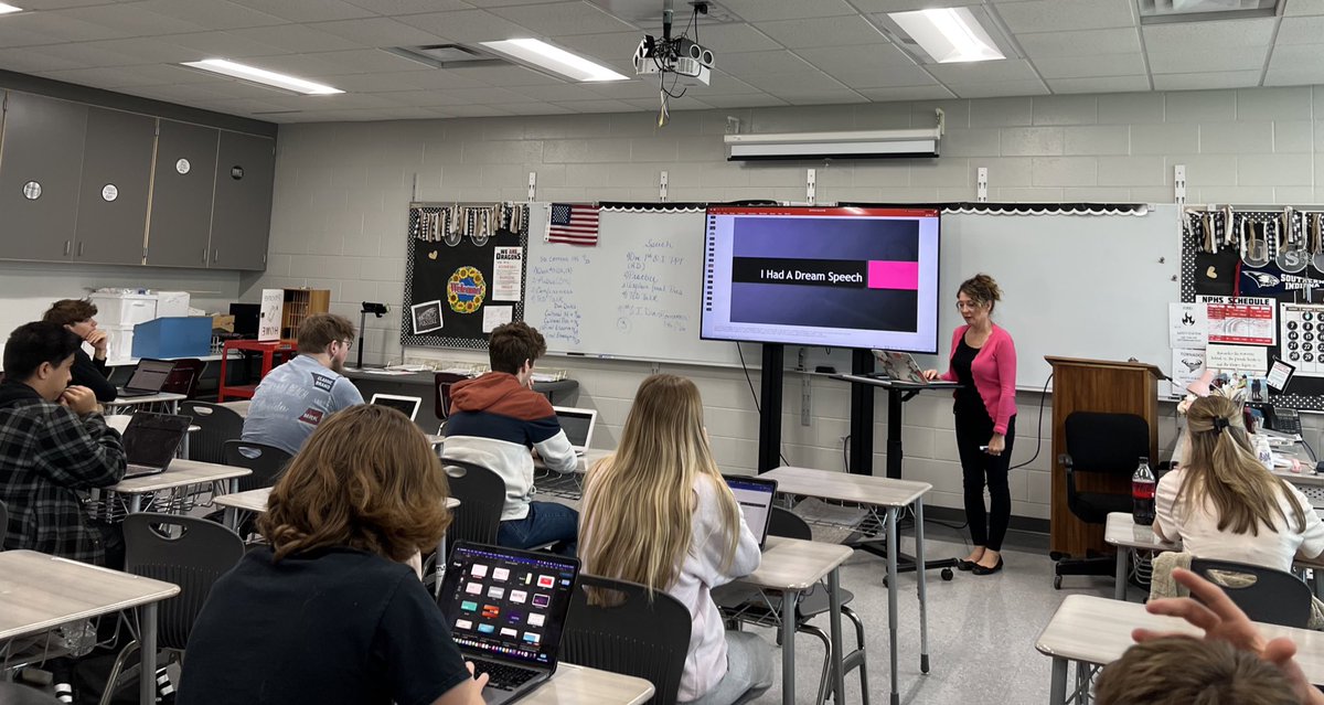 Students are being prepped for their next speech in @HaneyNPHS’s class.  She is showing them examples of high level projects from former students. @SouthernHancock @llantrip @ginapleak @NewPalAsstSup @BurkNPHS @MitchanerNPHS @MooreNPJH #WeAreDragons