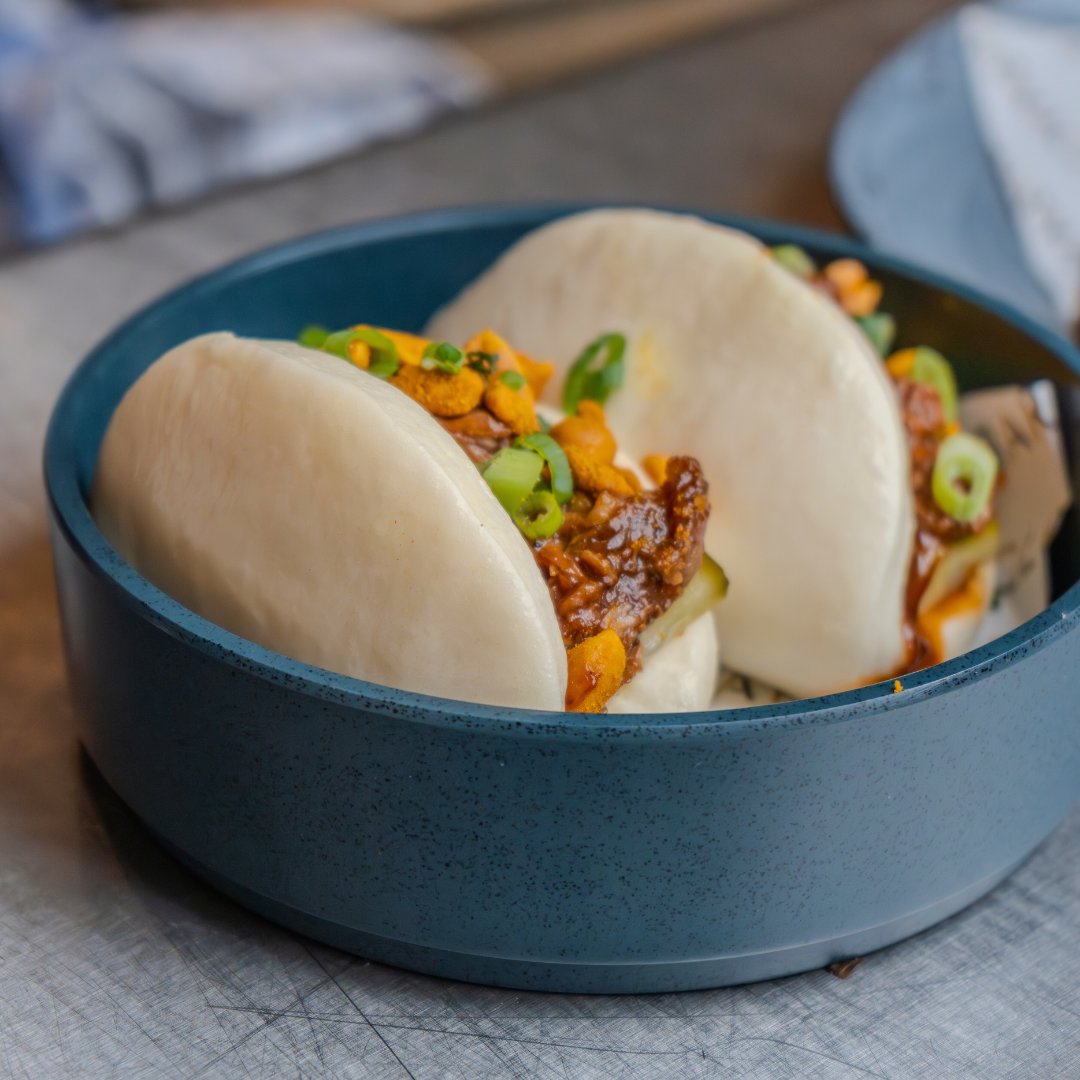 Barnaclelpool's tweet image. Our Hoisin Duck Bao Buns are to die for 🤩

Confit duck buns with hoisin sauce, spring onion, pickled cucumber and spiced peanut crumb 🥜

Would you try this? 😋

#baobuns #food #restaurant #liverpool