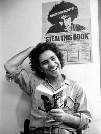 One of my personal heroes, Abbie Hoffman, holding a copy of 'Steal This Book' - a manual he released in 1971 with lots of handy info at the time, with instructions how to live free of the man and push back against the system. Absolute legend, this guy.