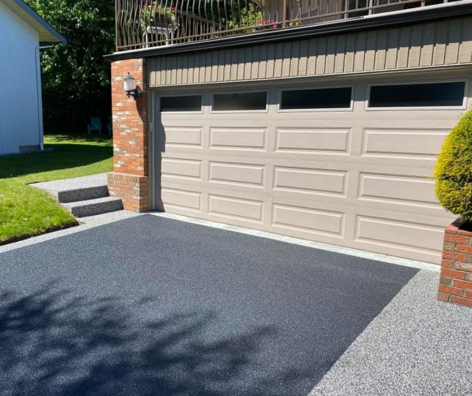 Adding borders to your driveway design can provide some nice options for side paths and entranceway paving. 

This family in Surrey went with our Charcoal colored driveway and Graphite colored paths and entrance. 

#EcoPaving