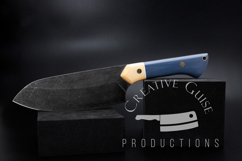 For the heart and soul of the modern home kitchen, we present a masterpiece designed not just to cook but to create experiences. This 6-inch chef's knife, meticulously handcrafted from 52100 high carbon steel, is the culinary partner you've been waiting for