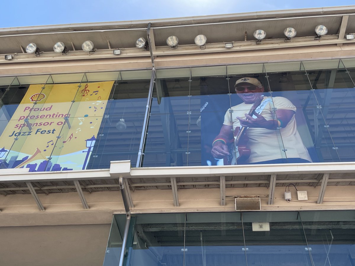 A giant ⁦@jimmybuffett⁩ watching over ⁦@jazzfest⁩ at the grandstand…