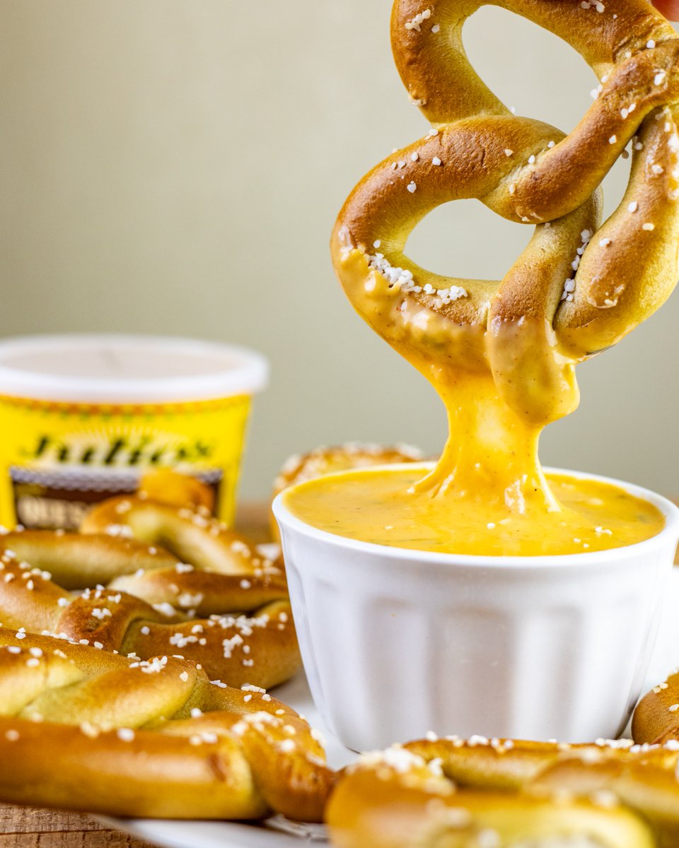 This snack is a 10/10! ⭐️ Pretzels + Julio's Homestyle Queso is the perfect combo for National 🥨 Day! 😃👍