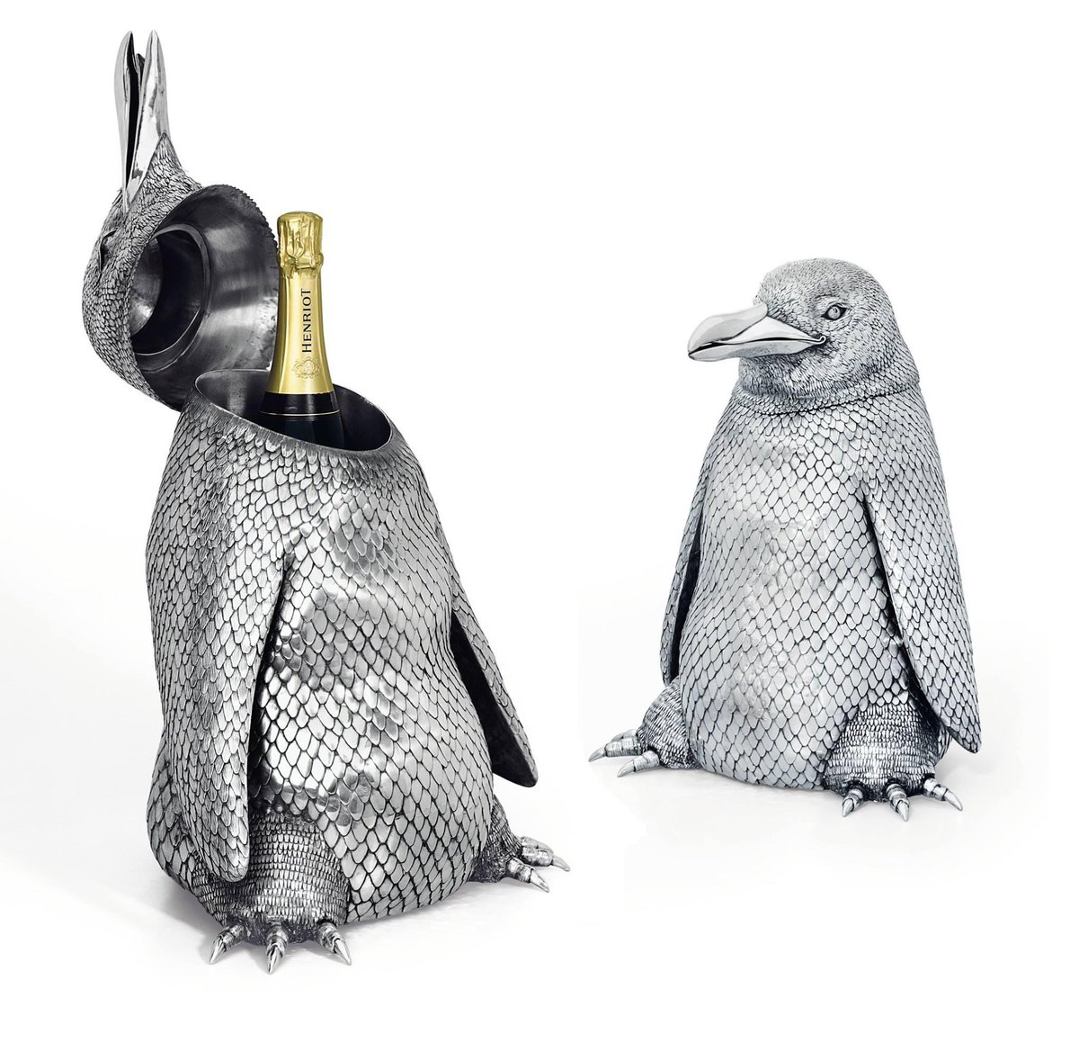 For your #WorldPenguinDay festivities: A Pair of Italian Silver #Penguin-Form Magnum Wine Coolers Mark of Mario Buccellati Sr., Milan, 1934-44 H 17 in. (42.5 cm); 290 oz. (9,023 g) christies.com/en/lot/lot-572…