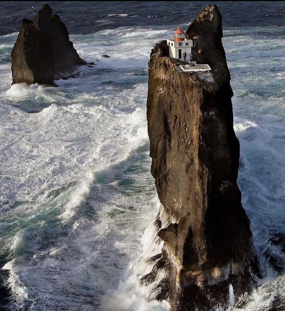 The Thridarangar lighthouse , south of Iceland, a few km from the Vestman Islands in the Atlantic Ocean. Built in 1939 and currently only reachable by helicopter.