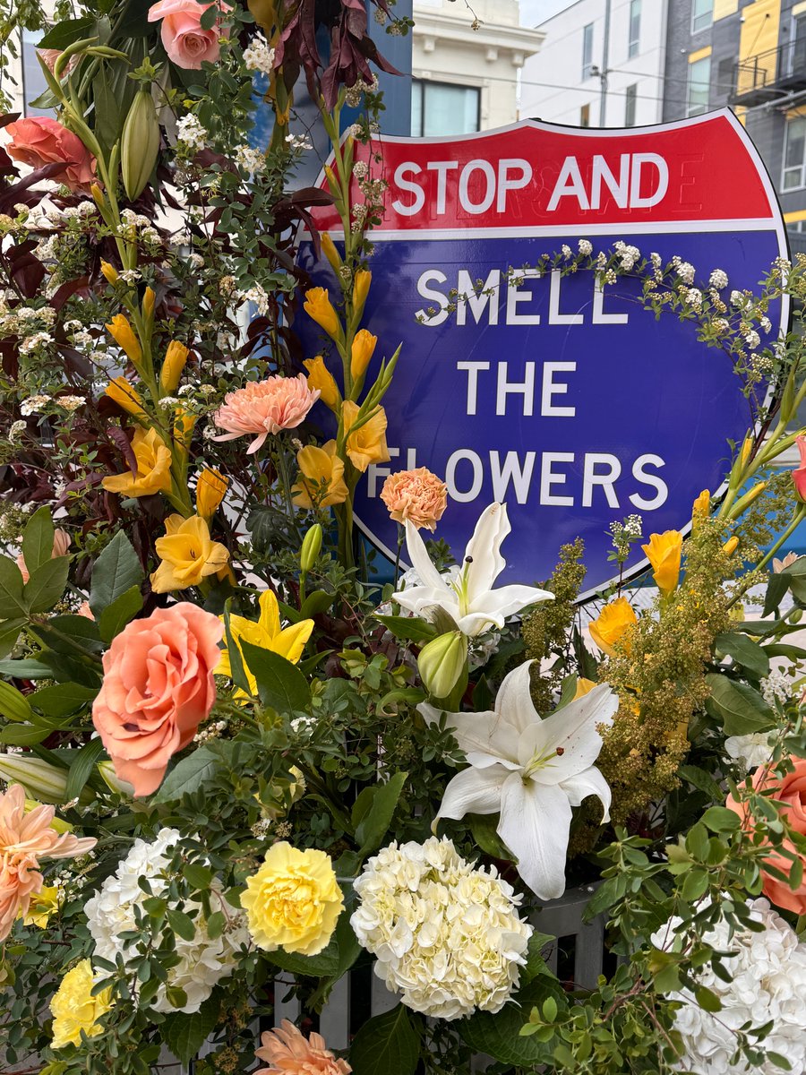 kcstreetcar's tweet image. April Showers bring May Flowers. Even in the rain, stop and smell the flowers.  For a limited time, the Crossroads SB stop at 19th &amp;amp; Main will be adorned w/ vibrant flowers. This is a 1st ever collaboration w/ the #kcstreetcar, @MADEMOBB &amp;amp; Lily Floral Designs.🌼