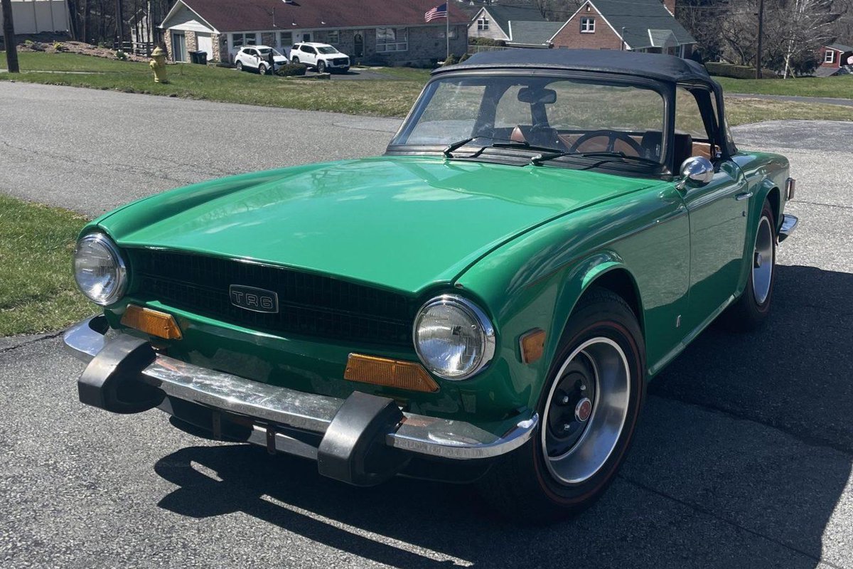 For Sale: 1974 Triumph TR6: This 1974 Triumph TR6 is finished in green over Chestnut vinyl and is powered by a 2.5-liter inline-six paired with a four-speed manual transmission. Equipment… dlvr.it/T61Q8Z Bringatrailer.com #carsofinstagram #carporn #classiccar