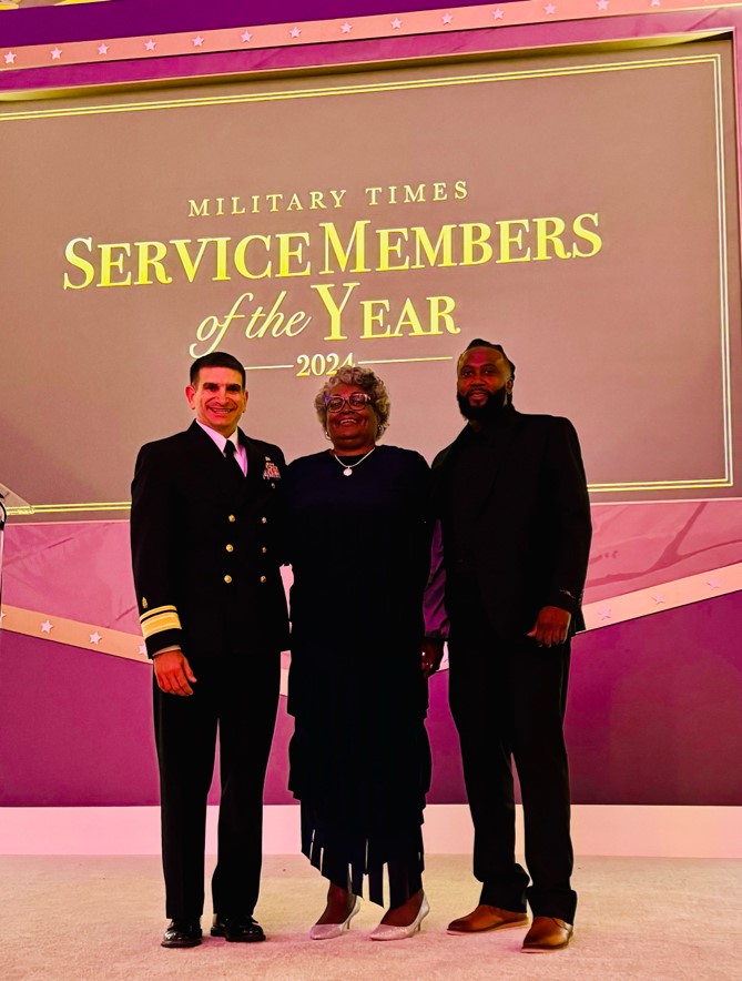 Personnel Specialist 1st Class Alexander Boston was recognized as the 2024 Military Times Sailor of the Year on April 24. Rear Adm. Rick Freedman, Navy Deputy Surgeon General presented the award. Boston is on duty at sea, so his spouse Sara Boston accepted the award for him.