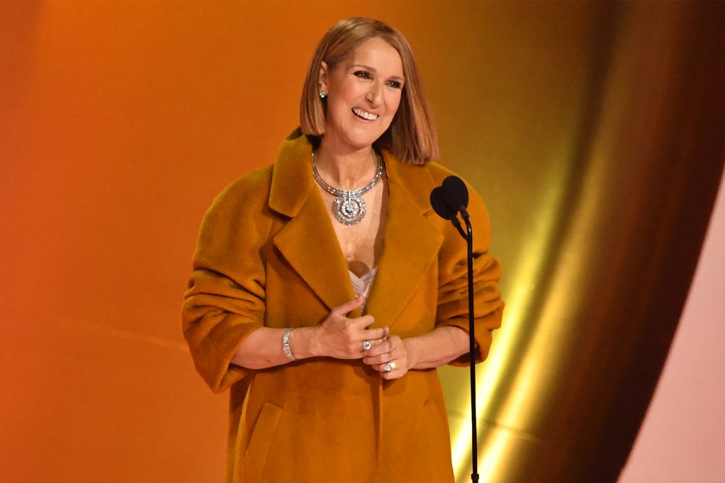 Celine Dion reveals reason for keeping her coat on at the 2024 Grammys trib.al/dQHN3eh