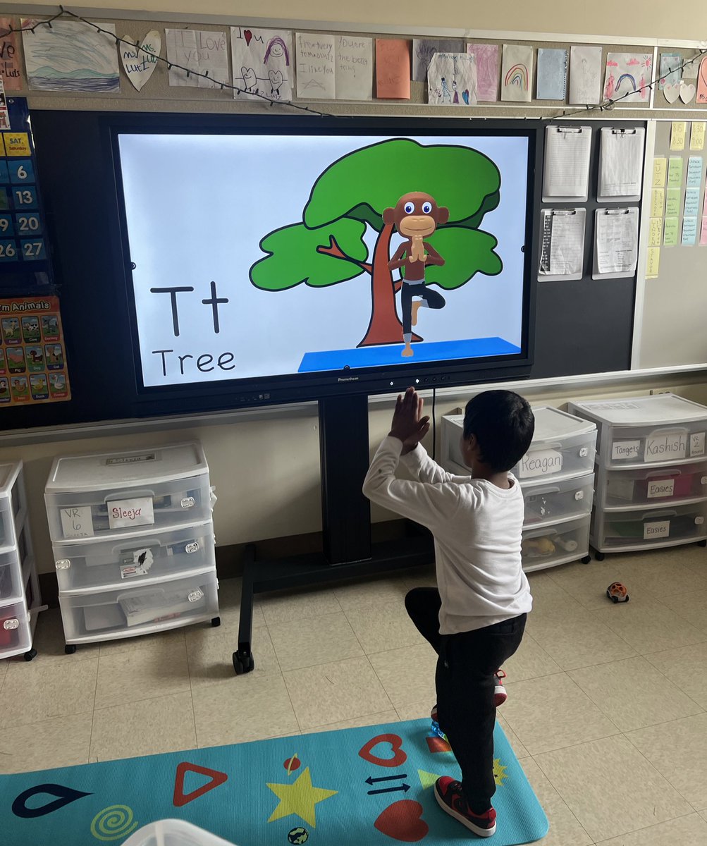 Practicing our letters and our yoga moves 🧘